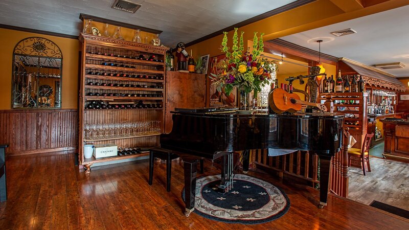 Restaurant entrance with piano