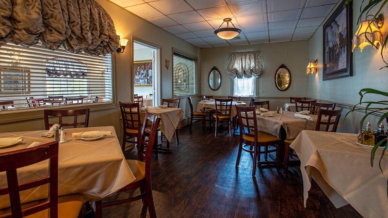 Rear dining room with set five tables